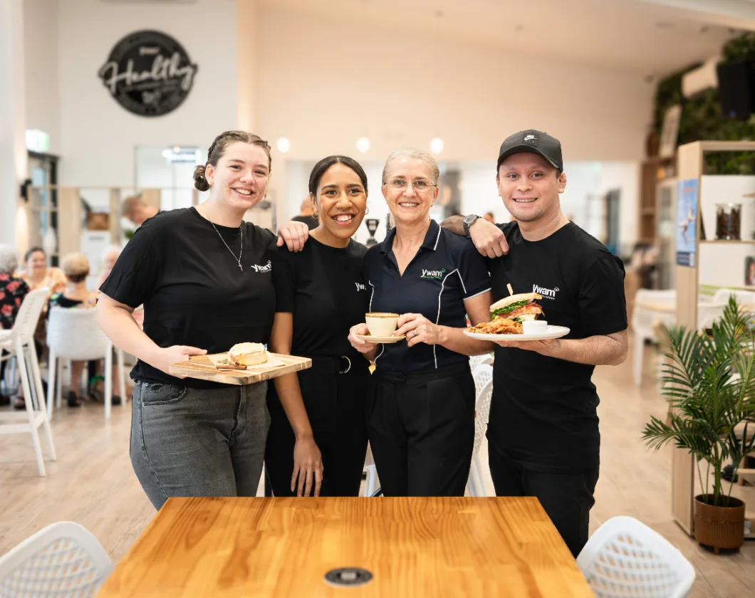 YWAM Precinct Cafe team with coffee and food